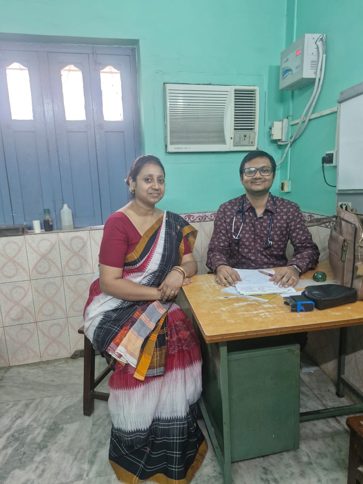 Dr. Surajit Hazra during a clinic consultation